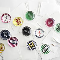 Mark and Graham's Domed Glass Paperweights personalized in a variety of fonts and styles. (Photo: Business Wire)