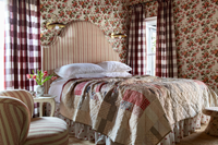 A Bedroom of the GreenRow Lake House at the Inn At Serenbe (Photo: GreenRow)